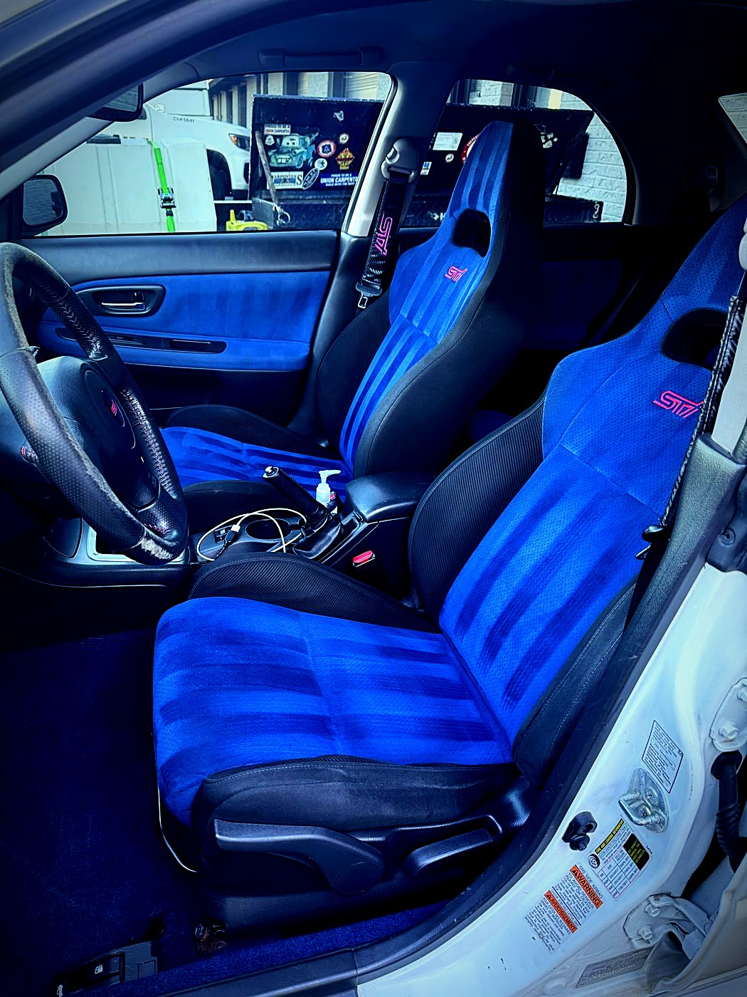 Blue sport seats after an interior shampoo