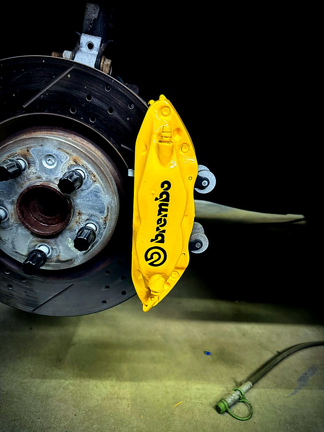 Yellow Brembo caliper repaint