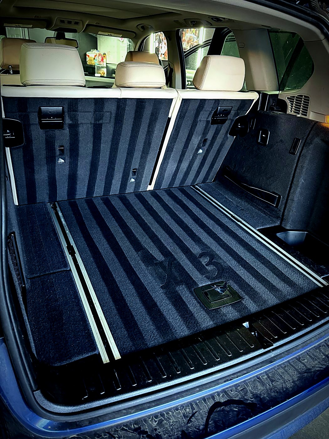 SUV cargo area vacuumed and cleaned