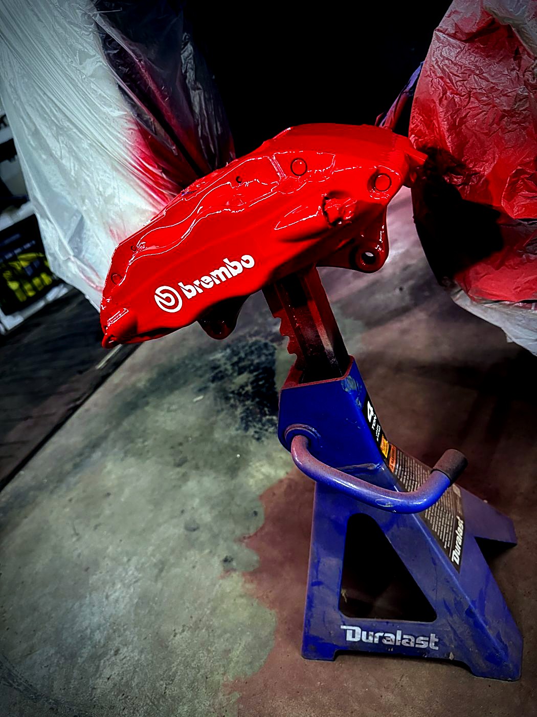 Red Brembo caliper with fresh gloss